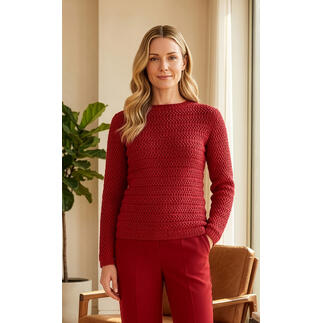 Roter Pullover mit reliefartigem Muster, modisch und stilvoll.