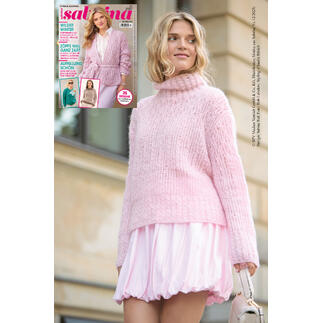 Rosa Pulli mit Zopfmuster aus Aerea, umgeben von einer modischen Umgebung.
