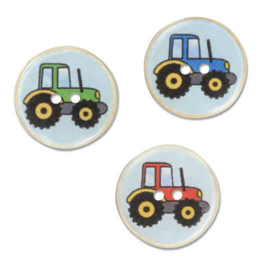 Drei Kokosknöpfe mit Trecker-Design in verschiedenen Farben.