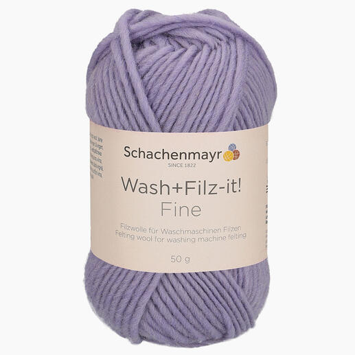 Wollknäuel 'Wash+Filz-it! Fine' von Schachenmayr in Lavendel auf weißem Hintergrund.