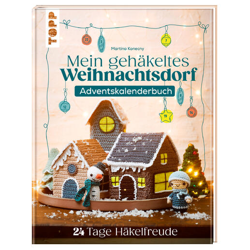 Adventskalenderbuch mit einem gehäkelten Weihnachtsdorf und Figuren in warmen Farben.