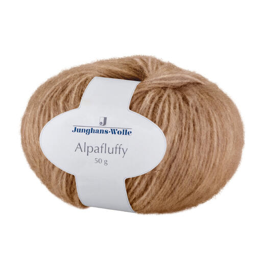 Beiges Alpafluffy Garn in einer 50g Rolle mit Etikett.
