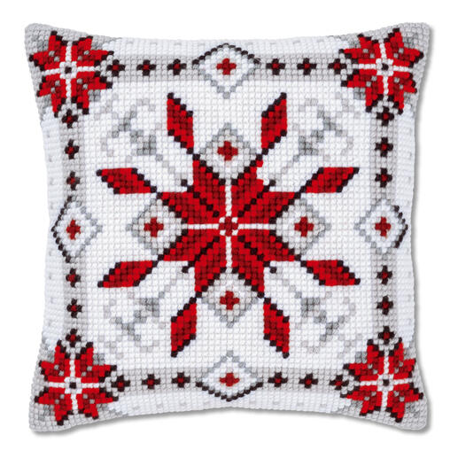 Kreuzstichkissen mit rotem Eiskristall auf weißem Hintergrund