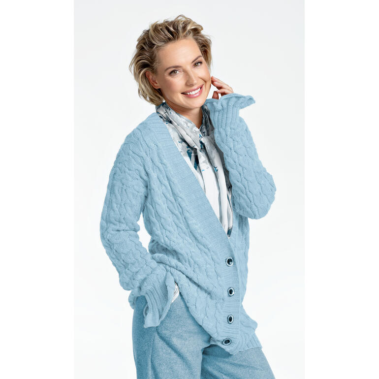 Hellblaue Jacke aus Babyboomer mit Knöpfen und strukturiertem Design.