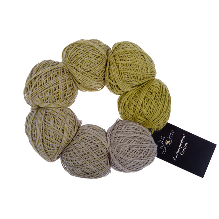Zauberperlen® Cotton von Schoppel Wolle in einer runden Anordnung.