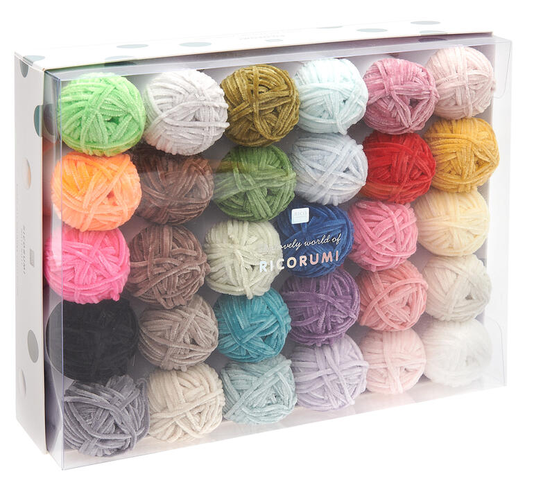 Dreißig bunte Wolle in einer transparenten Box.