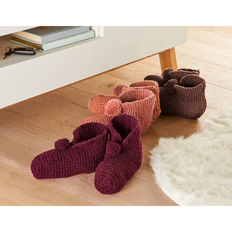 Hausschuhe aus Scala in verschiedenen warmen Farben.