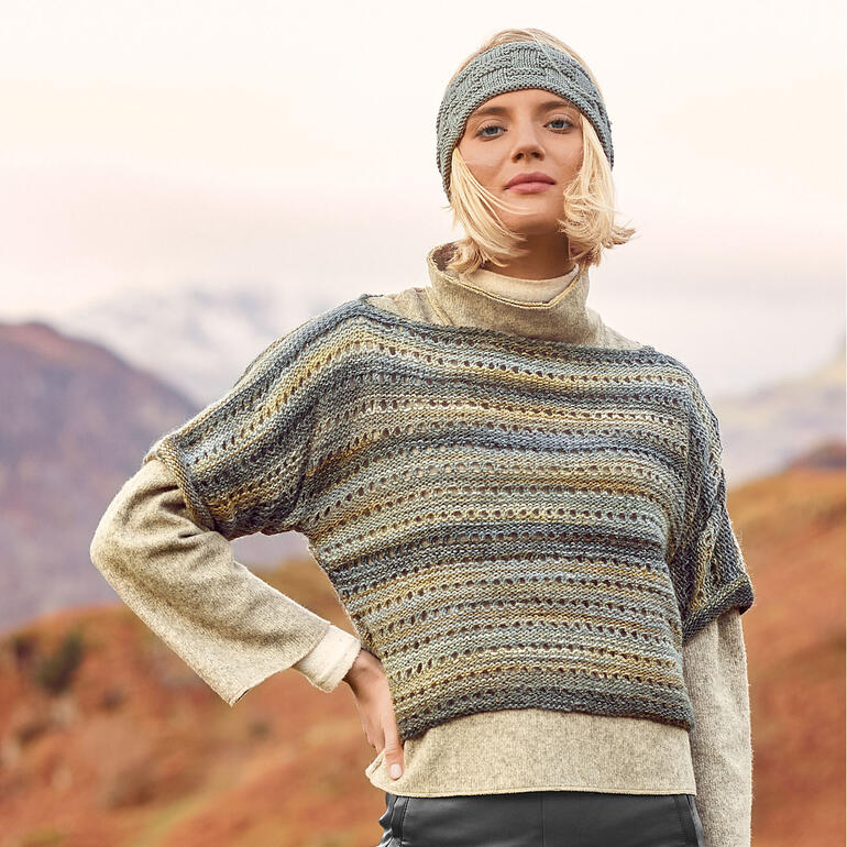 Modischer Pullover mit verschiedenen Farben und Mustern.