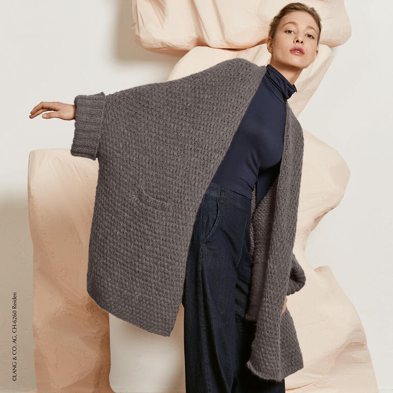 Schlichte graue Jacke in lässigem Schnitt.