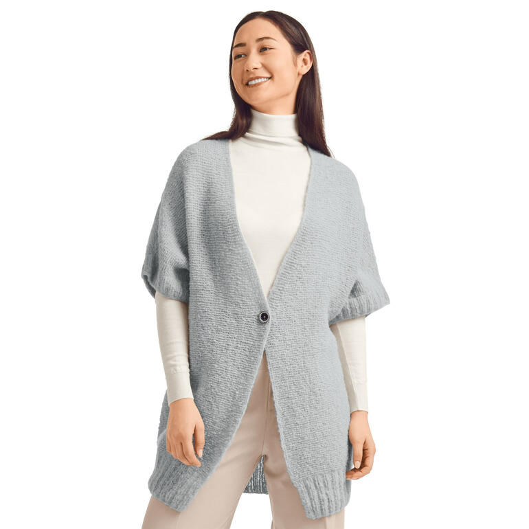 Helle Weste aus Arequipa mit weiten Ärmeln und einem Knopf.