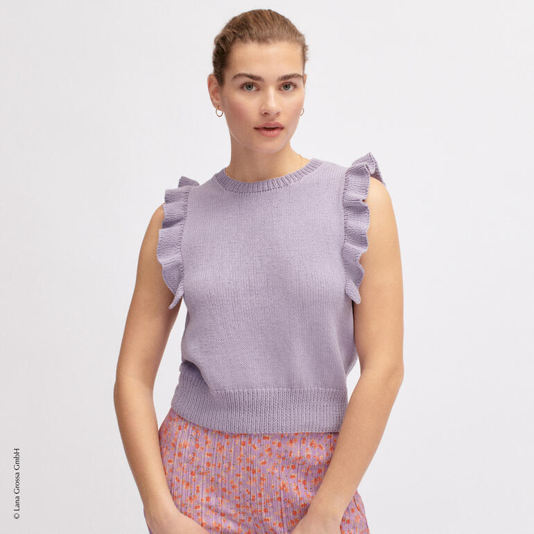 Top aus Elastico in zartem Lila mit Rüschendetails an den Schultern.
