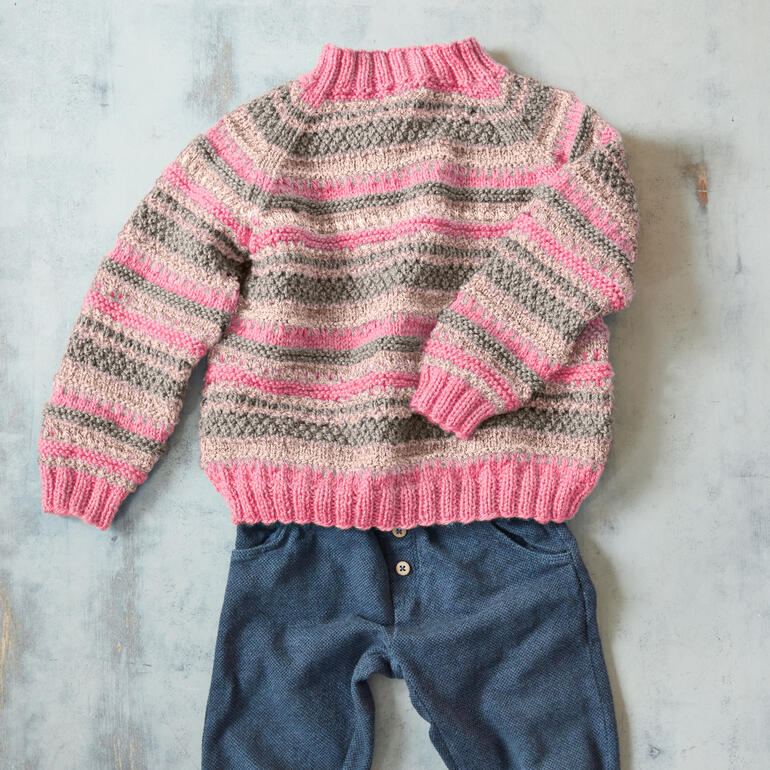 Pullover aus Enny mit pink-blauem Streifenmuster, ideal für Kinder