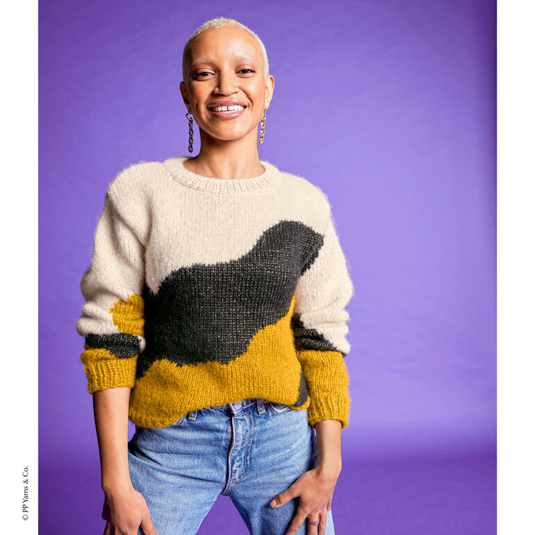 Pullover aus Pingo Salsa mit kreativen Farbblöcken und lässiger Passform.