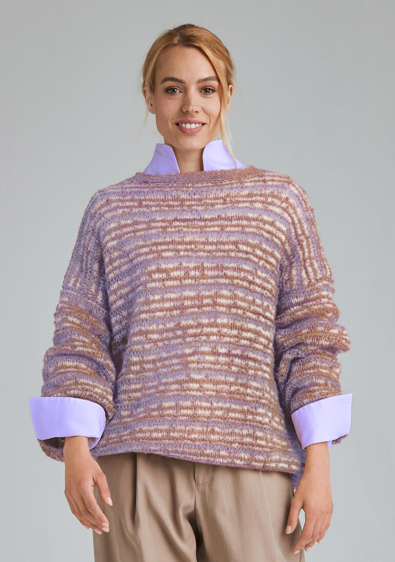 Pullover aus Stoccolma und Animals in sanften Farben mit weitem Schnitt.