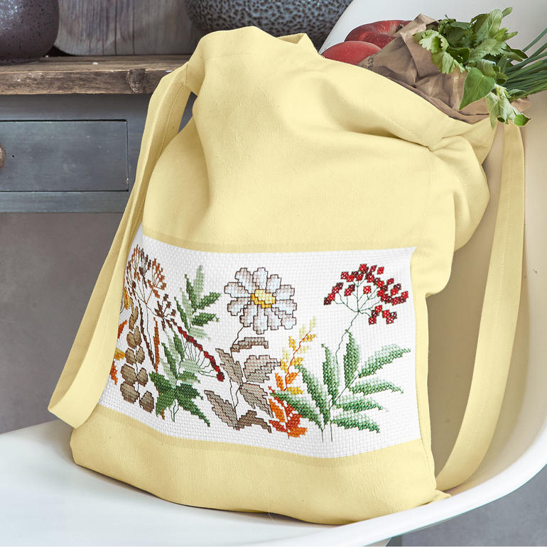 Baumwolltasche mit buntem Blumenstickerei-Design.